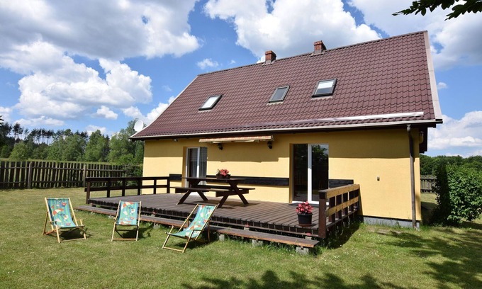 Parchowo House | Holiday Home by Lake with Boat in Poland