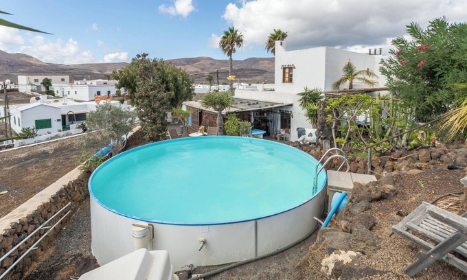 Guatiza House | Holiday Home Casa Cueva with Mountain View, Pool, Wi-Fi & Terrace