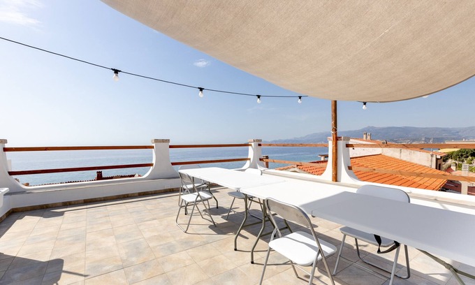 Porto Alabe House | Holiday Home 'Casa Simo' with Sea View, Wi-Fi and Air Conditioning