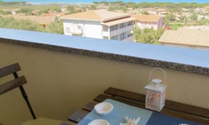 Iscra e Voes House | Holiday Home 'Casa Vacanza Sa Petra Ruja B' with Sea View, Balcony and Air Conditioning