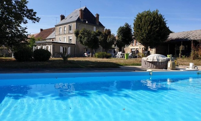 Bussiere-Dunoise House | Holiday Home 'Domaine De La Caure' with Shared Pool, Wi-Fi and Air Conditioning