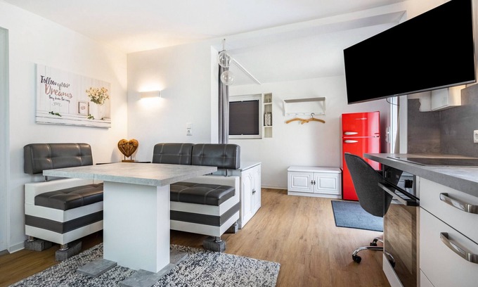 Bad Bodenteich Apartment | Holiday Home 'Ferienwohnung Am See' with Lake View, Private Terrace and Wi-Fi