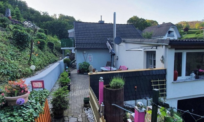 Reichshof House | Holiday Home 'Ferienhaus Am Wald' with Private Terrace, Private Garden and Wi-Fi