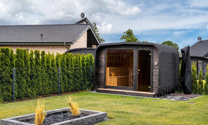 Barssel House | Holiday Home 'Ferienhaus Am See Mit Sauna' with Private Terrace, Private Garden and Wi-Fi