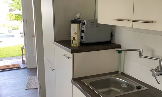 Marne House | Holiday Home 'Ferienhaus Marne' with Private Terrace, Private Garden and Wi-Fi
