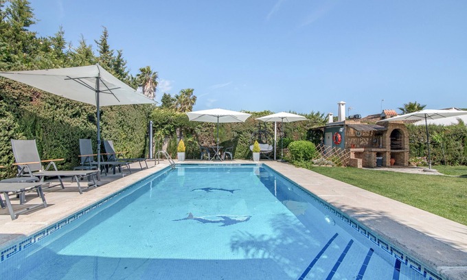 Aljaraque House | Holiday Home 'Golf Azul' with Shared Pool, Wi-Fi and Air Conditioning