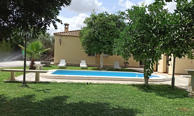 Marchena House | Holiday Home 'Hacienda Nápoles Marchena' with Private Pool, Wi-Fi and Air Conditioning
