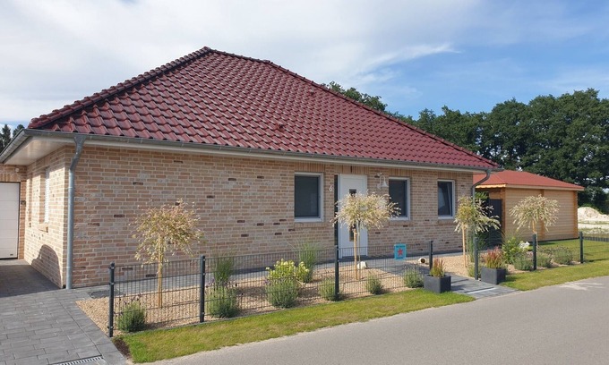 Walchum House | Holiday Home "Haus Seestern" with Lake View, Private Terrace and Wi-Fi