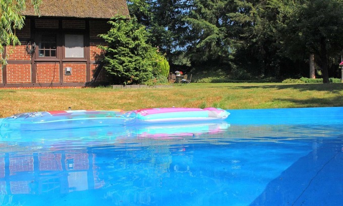 Kirchdorf House | Holiday Home in Kirchdorf with Swimming Pool