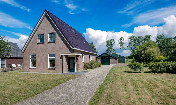 Langezwaag House | Holiday Home in Langezwaag with terrace