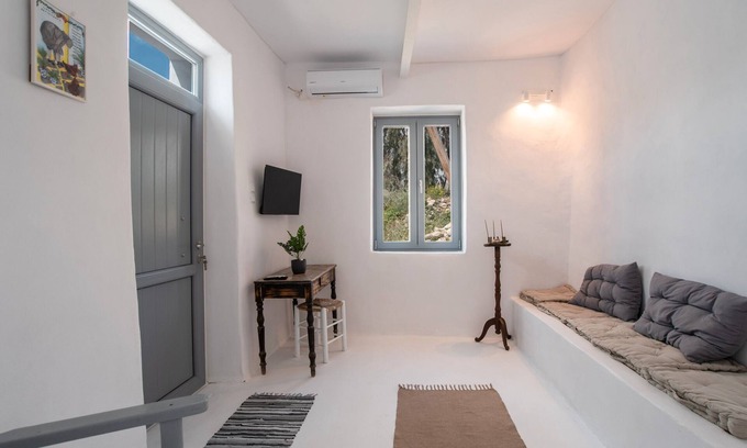 Marpissa House | Holiday Home 'Kalesma Marpissa' with Sea View, Private Terrace and Air Conditioning