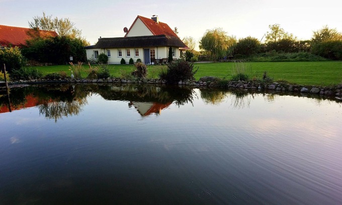 Kalkhorst House | Holiday Home "Naturteich Haus" with Private Swimming Pond, Private Terraces & Wi-Fi