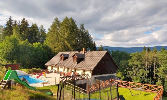 Vrchlabi Ski Chalet | Holiday home on the edge of the forest with swimming pool and sauna