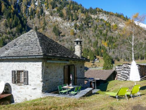 Blenio House | Holiday Home Rustico Stübii by Interhome