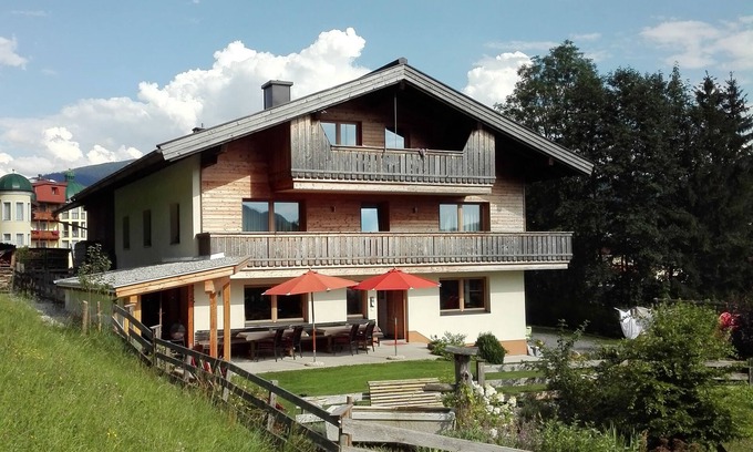 Koessen House | Holiday home Sonnhof am Walchsee in Tyrol, near the lake, lake view, garden, play area
