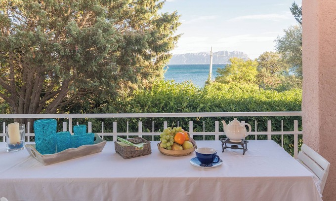 Pittulongu House | Holiday Home "Villa Rosa sul Mare" with Sea View, Terraces & Wi-Fi