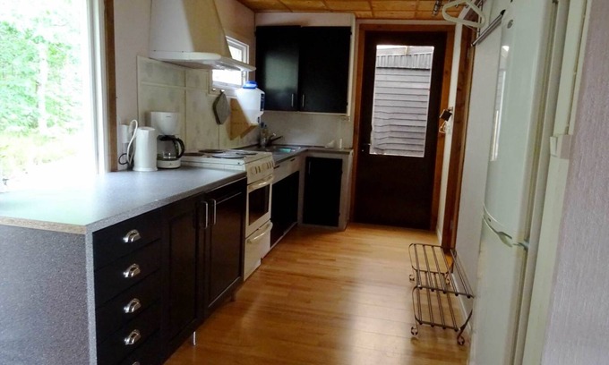 Hultsfred House | Holiday home with direct lake location and bridge
