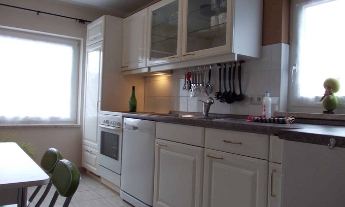 Rambin House | Holiday home with fireplace and barbecue in the garden