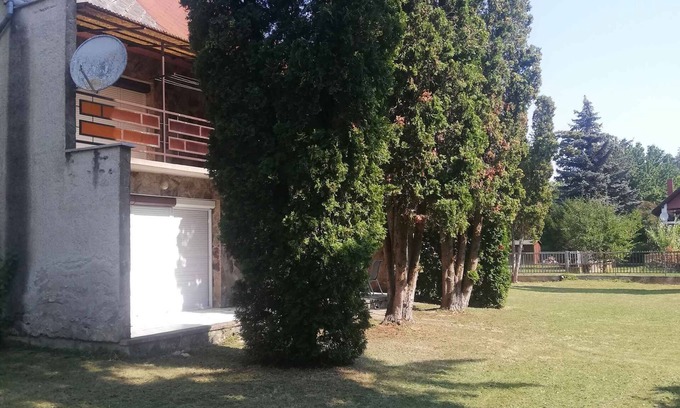 Keszthely House | Holiday home with large garden, children's playground and closed parking lot.