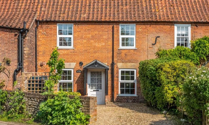 Docking House | Hollyhocks