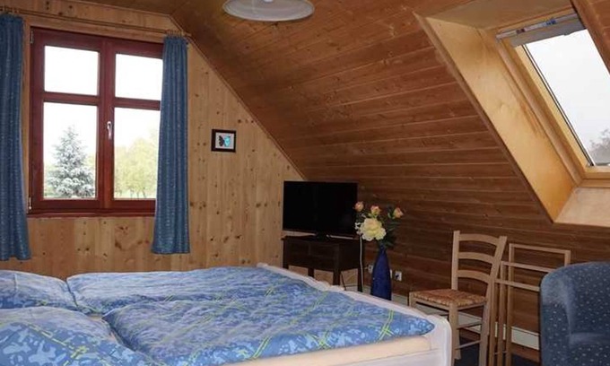 Hinrichshagen Apartment | Holz 100 Haus EZ Süd - Guesthouses Eva-Maria and Reinhard Köhler