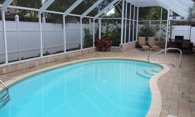 Tarpon Springs House | Home away from Home? Paradise in the Sun? Why not call it both! HEATED Pool !