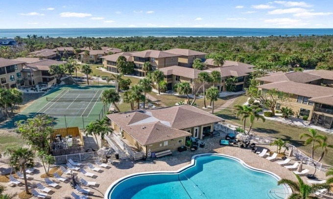 Sanibel Condo | Home away from Home with a pool, pickleball and breathtaking Beach Sunsets