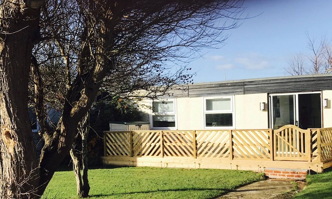 Earnley Ski Chalet | Home from home, for families, couples and pets. Inc heated pool, pub, crazy golf