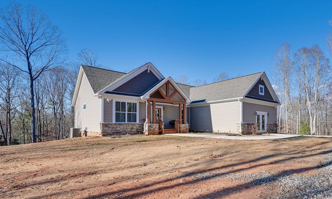 Roaring River House | Home Gym & Fireplace: Roaring River Retreat