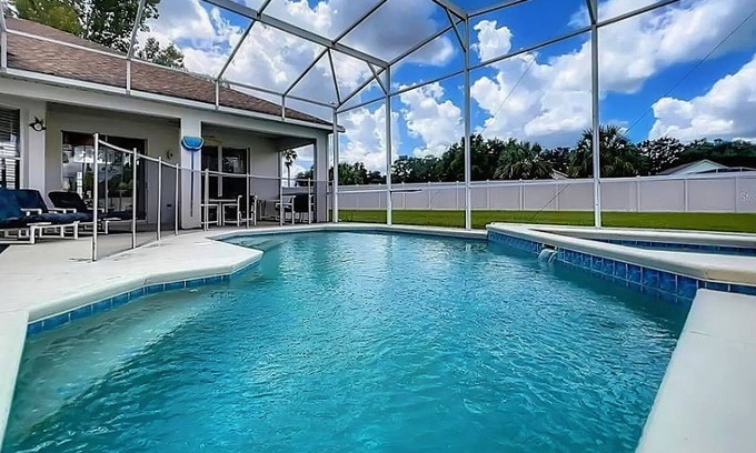 Westridge House | Home near Disney/golf with screened pool, spa, pool table, foosball, AC, & W/D