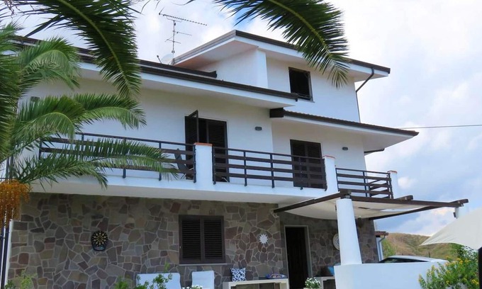 Brancaleone Marina House | Homerez - 200 m away from the beach! House for 10 ppl. with jacuzzi and sea view