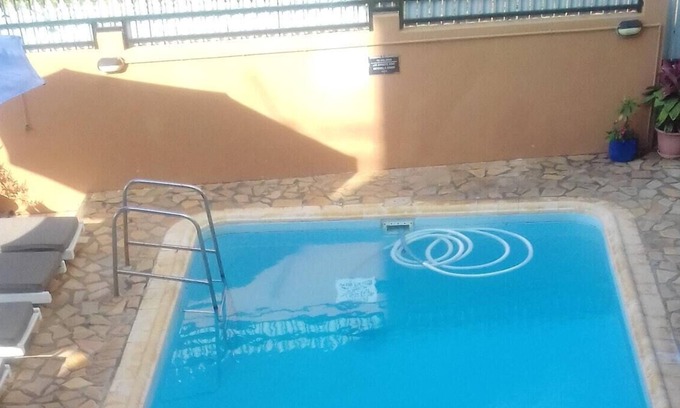 Pointe aux Biches Apartment | Homerez - 200 m away from the beach! Appartement for 4 ppl. with shared pool
