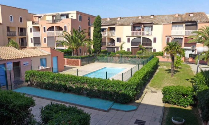 Les Arenes Apartment | Homerez - Appartement 900 m away from the beach for 4 ppl. with shared pool