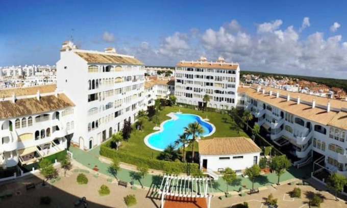 El Portil Apartment | Homerez - Apt. El Portil, pool.