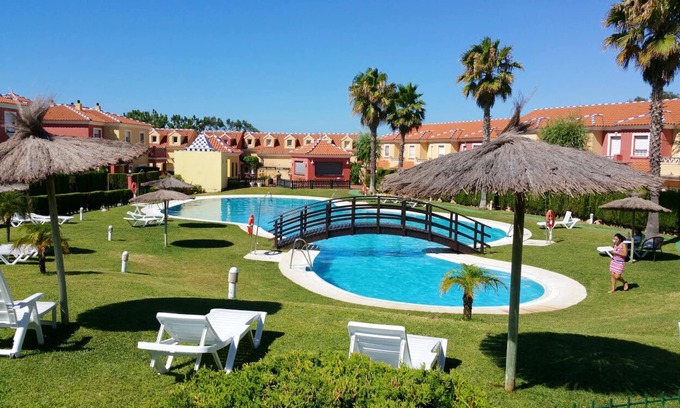 Islantilla Apartment | Homerez - Apt in Islantilla, pool.