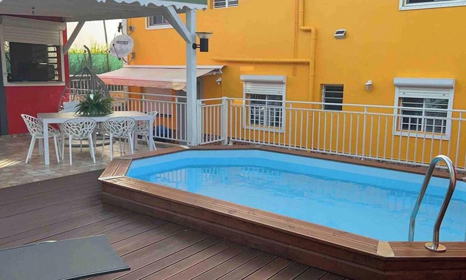 Les Abymes Apartment | Homerez - Apt Les Abymes, private pool.