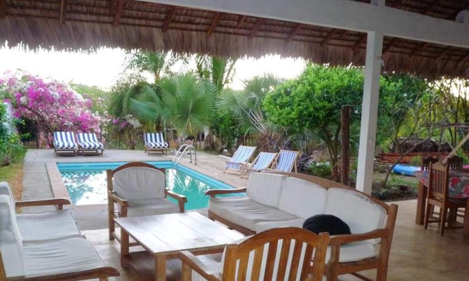 Nosy Be House | Homerez - Bungalow for 4 ppl. with shared pool, sea view and garden at Andilana