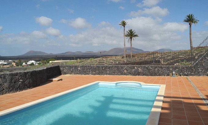 Yaiza Ski Chalet | Homerez - Chalet in Yaiza with Fireplace