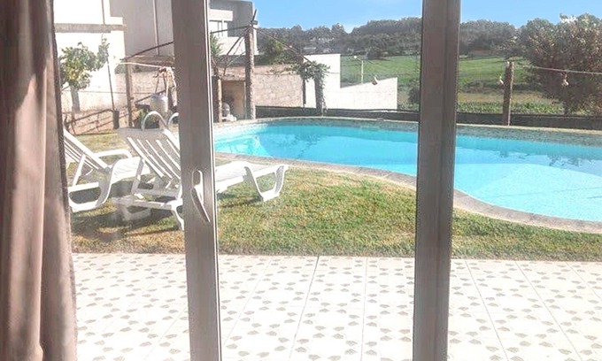 Vila Nova de Famalicao House | Homerez - Charming House in Requião with Shared Pool
