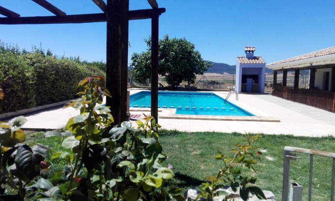 Caravaca de la Cruz House | Homerez - House for 8 ppl. with shared pool, jacuzzi and terrace at Noguericas