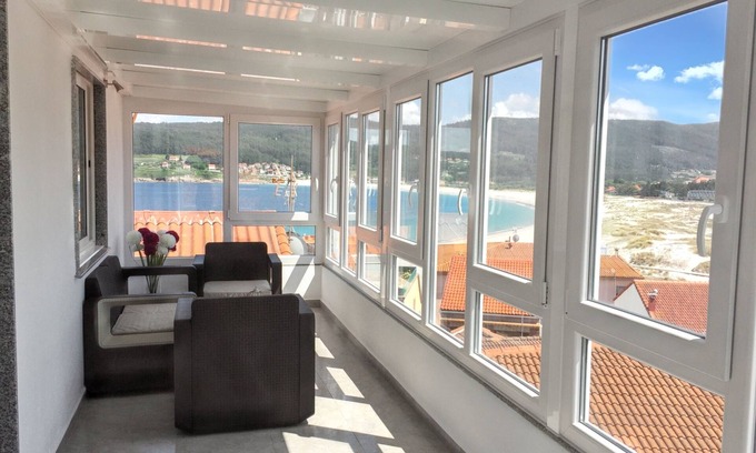 Laxe Apartment | Homerez - Spacious Apartment Facing the Sea - Laxe - 75 m² - Terrace