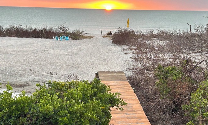 Placida Cottage | Honeymoon or Anniversary getaway beachfront with bay dock!