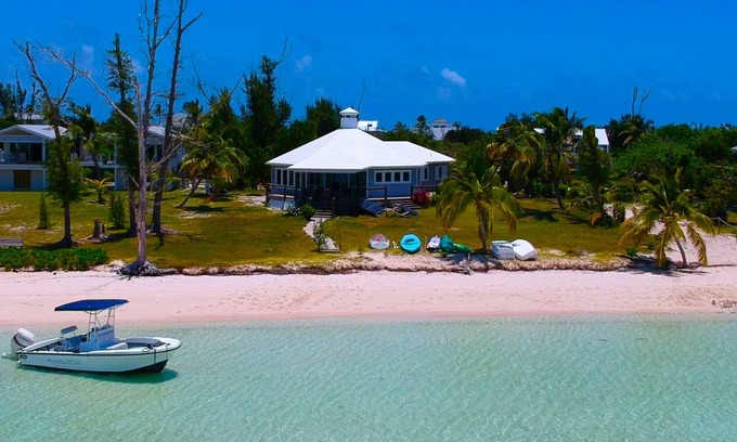Hope Town House | Hope Town's Top Rental: Beachfront sunsets, AC, free boat dock, & close to town!