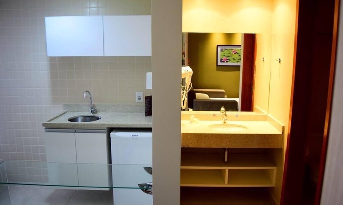 Prive das Caldas Apartment | Hot Springs apartment with bathtub and 24h pool access
