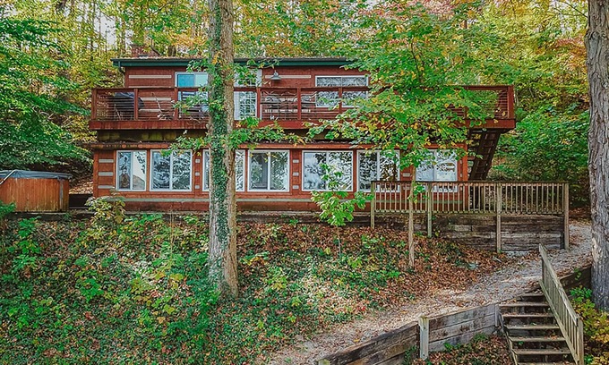 Heltonville Cabin | Hot tub overlooking Lake Monroe. Pet Friendly!