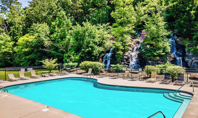 Sevierville Cabin | Hot Tub, Stunning Views, Indoor/Outdoor Pools, Game Loft & Mini Golf