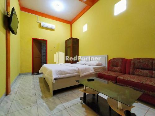 Buton Babau Hotel | Hotel Hing Amimah Mitra RedDoorz