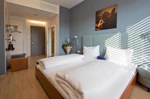 Feldbach Hotel | Hotel Lava Inn - 24 h Check-In - Nähe LKH, Landeskrankenhaus, Feldbach