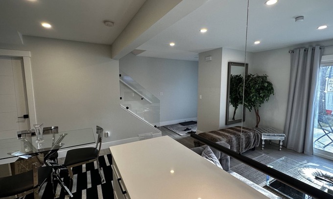 Southeast Calgary House | Hotel living, newly renovated, AC, minutes to DT
