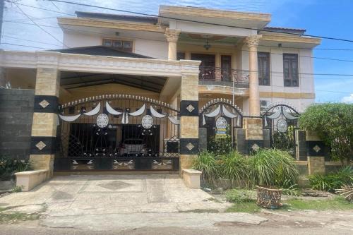 Lhokseumawe Hotel | Hotel O Homestay Pakmuklis Syariah 2 Near Taman Mini Lhokseumawe